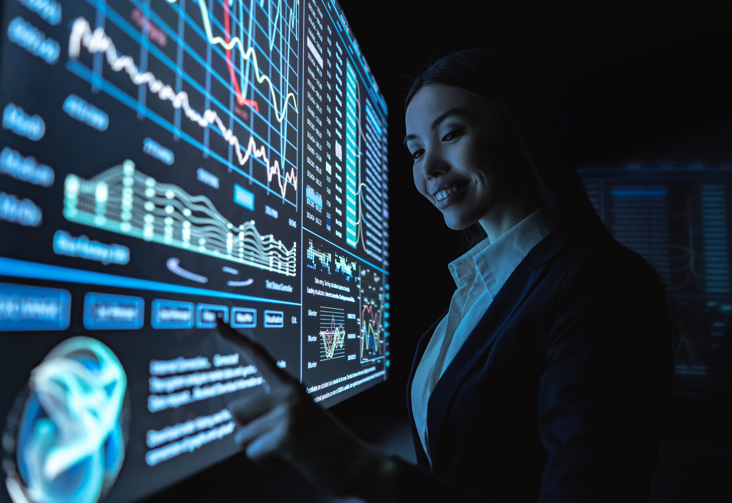 Operator using futuristic sensor dashboard for revenue infrastructure oversight